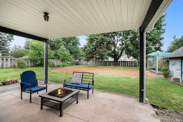 view of patio with an outdoor fire pit