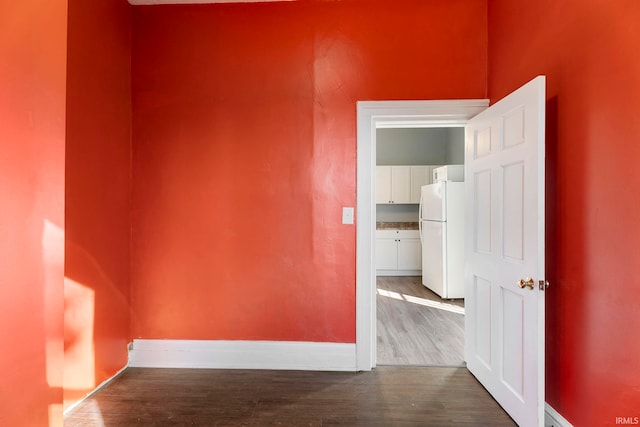 spare room featuring light hardwood / wood-style flooring