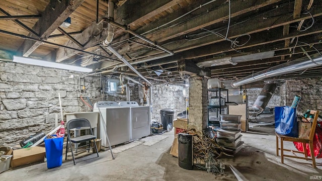 basement featuring washer and dryer