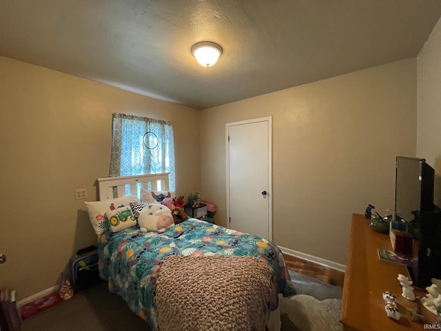 bedroom with baseboards