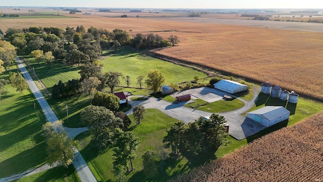 birds eye view of property with a rural view