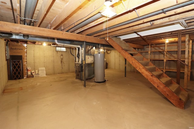 basement with heating unit and gas water heater