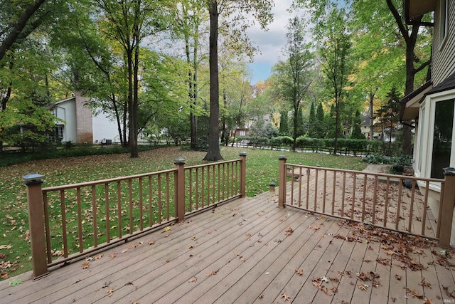 deck featuring a lawn