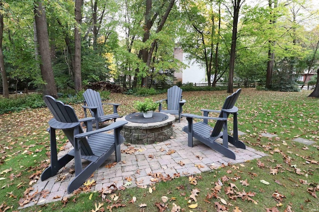 view of patio with a fire pit