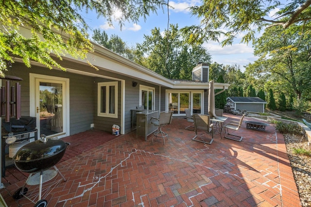 view of patio / terrace featuring a jacuzzi