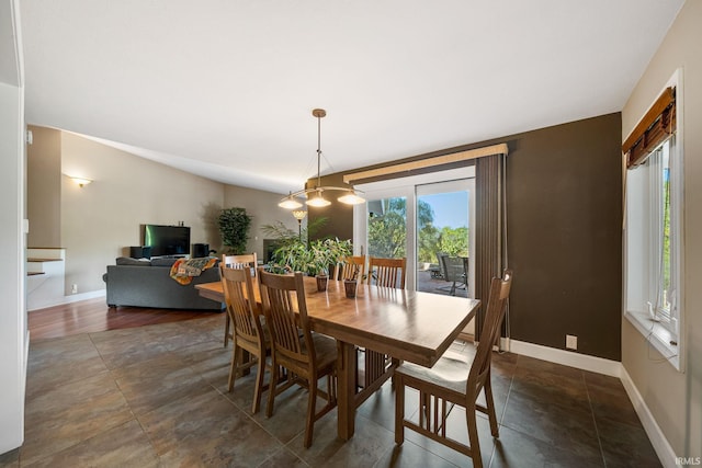 dining area featuring a chandelier