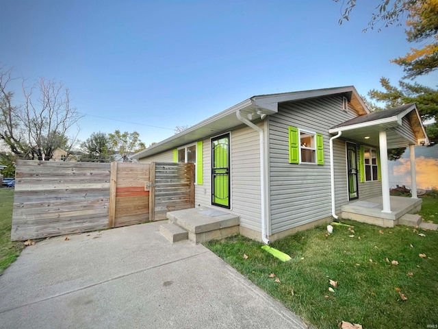 view of home's exterior featuring a yard