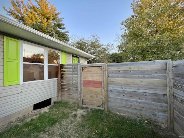 view of property exterior with fence