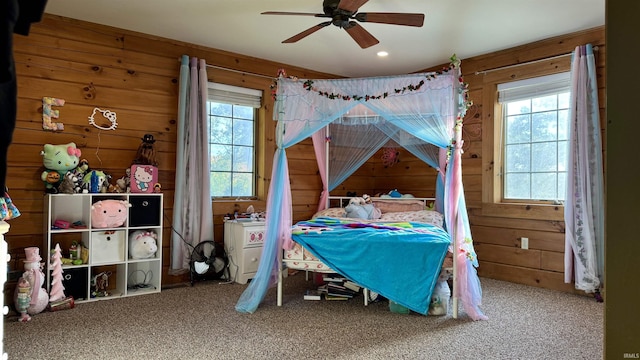 15597 Buck Knob Ln, Loogootee, IN 47553 - carpeted bedroom with wood walls, ceiling fan, and recessed lighting