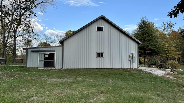 15597 Buck Knob Ln, Loogootee, IN 47553 - view of side of home with a yard and board and batten siding