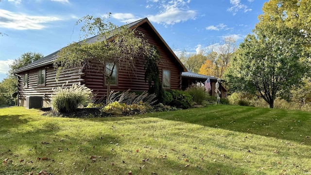 15597 Buck Knob Ln, Loogootee, IN 47553 - view of property exterior featuring log exterior and a yard