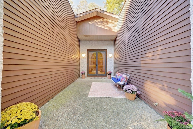 doorway to property featuring a patio