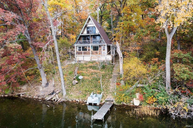 exterior space with a water view