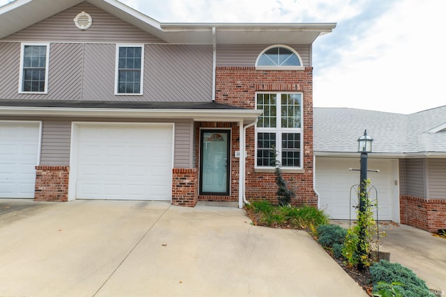 view of property featuring a garage