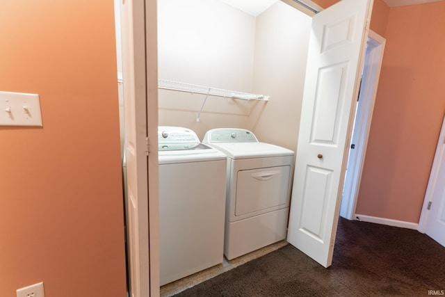 washroom with carpet flooring and separate washer and dryer