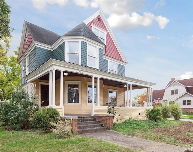 1025 W Lincolnway, Mishawaka, IN 46545 - victorian home with covered porch