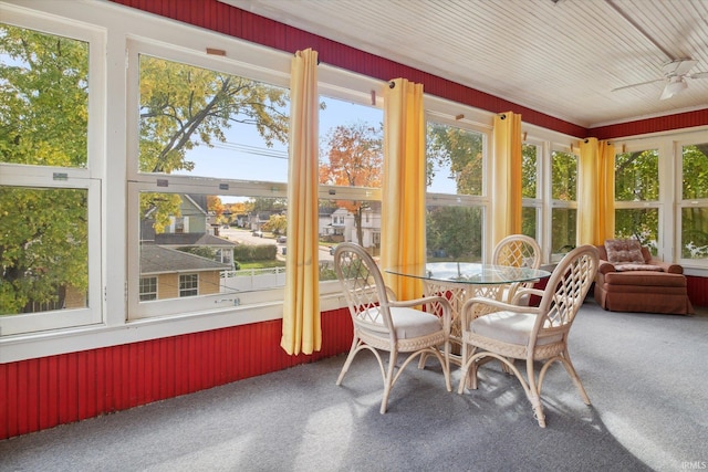 sunroom / solarium with ceiling fan