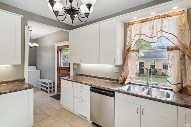 1025 W Lincolnway, Mishawaka, IN 46545 - kitchen with an inviting chandelier, washer / dryer, dark countertops, a sink, and dishwasher