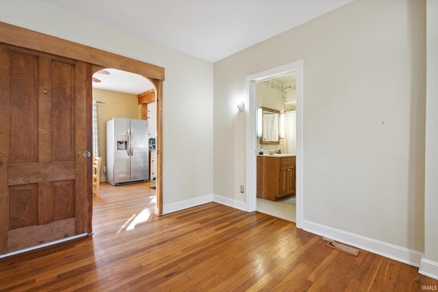 interior space featuring light hardwood / wood-style floors and sink