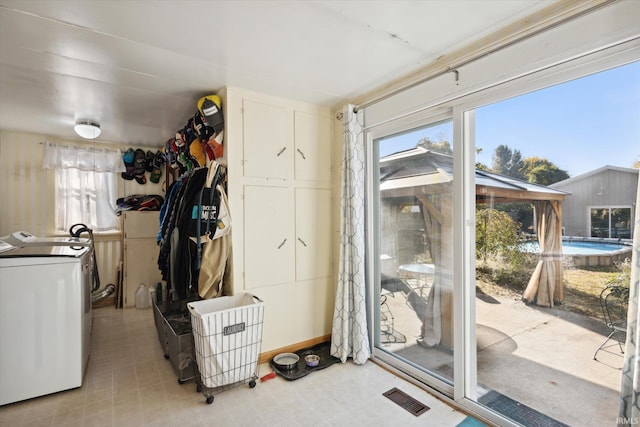 interior space featuring washing machine and clothes dryer