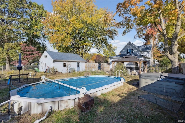 view of swimming pool featuring a gazebo