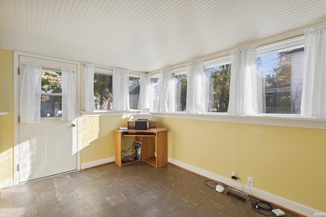 view of unfurnished sunroom