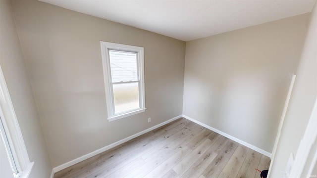 empty room with light wood-type flooring