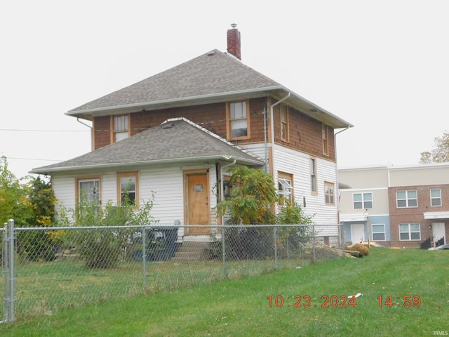 view of front of property with a front lawn