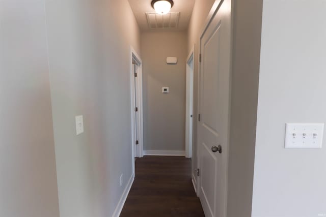 3088 Ashdon Dr, Newburgh, IN 47630 - corridor with baseboards, visible vents, and dark wood finished floors