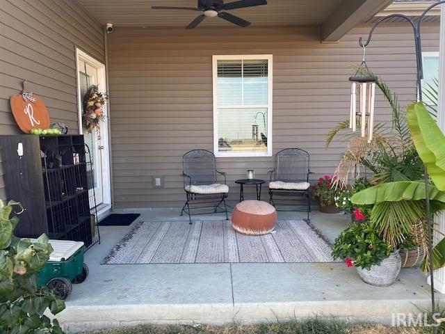 view of patio / terrace featuring ceiling fan