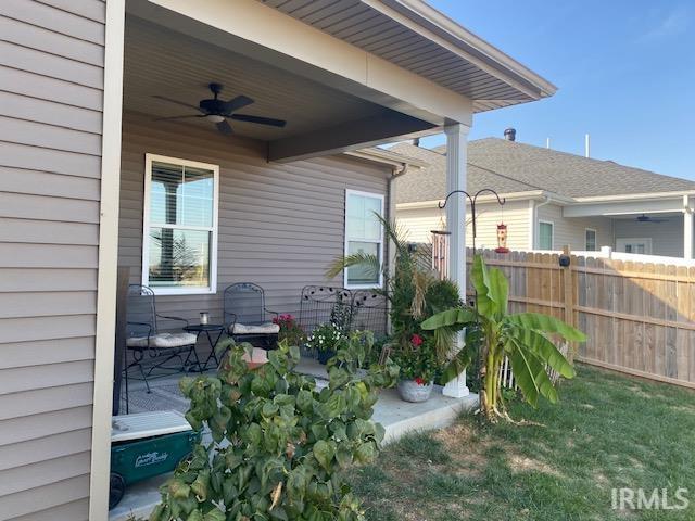 3088 Ashdon Dr, Newburgh, IN 47630 - exterior space with fence, a patio, and a ceiling fan