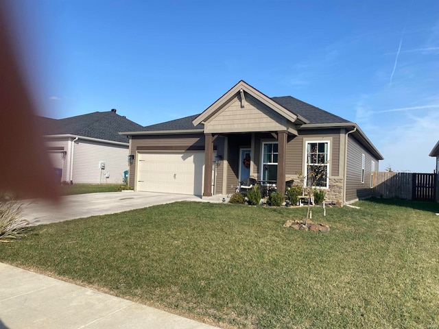 view of front facade featuring a front yard and a garage