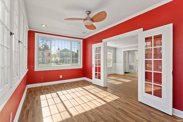 interior space with french doors and ceiling fan