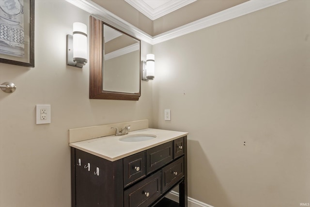 bathroom with vanity and ornamental molding