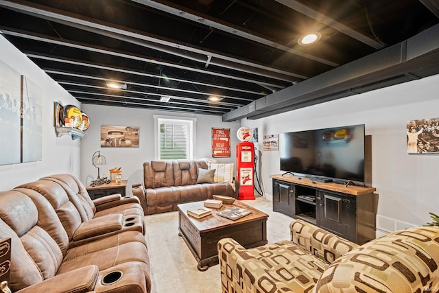 carpeted living room featuring beam ceiling