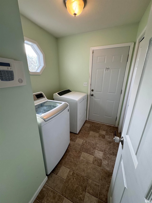 laundry room with washer and clothes dryer