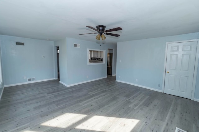 unfurnished living room with light hardwood / wood-style floors and ceiling fan