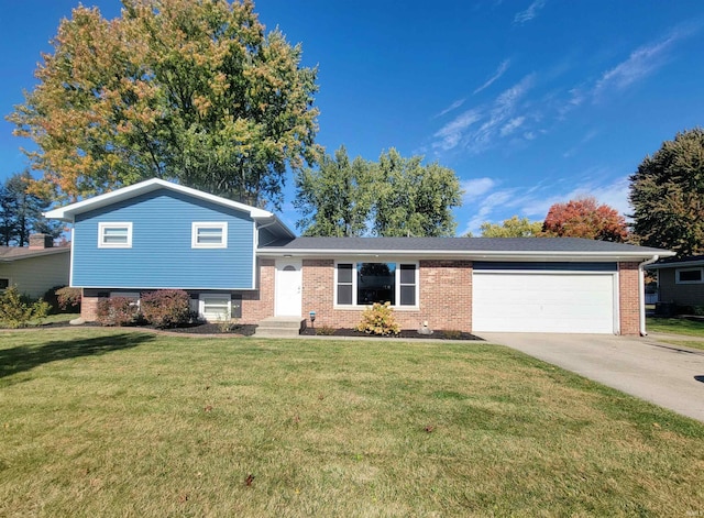 split level home featuring a front yard and a garage