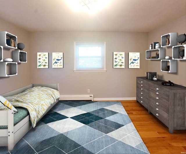 bedroom featuring wood-type flooring and baseboard heating