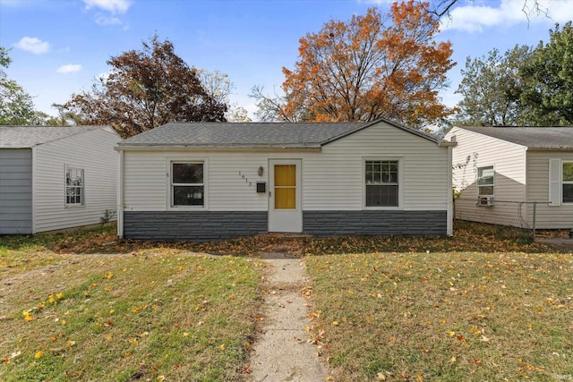 view of front of property with a front lawn