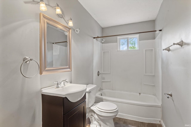 full bathroom featuring vanity, shower / tub combination, and toilet