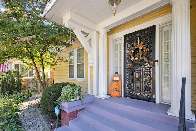 doorway to property with a porch