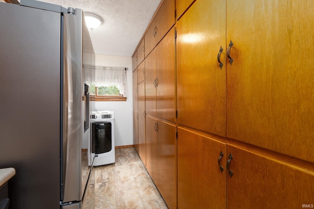 washroom with a textured ceiling