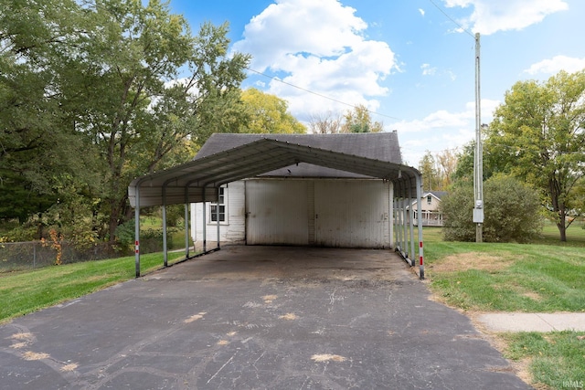 view of car parking featuring a yard and a carport