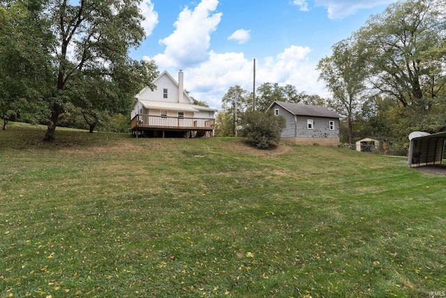 view of yard with a deck