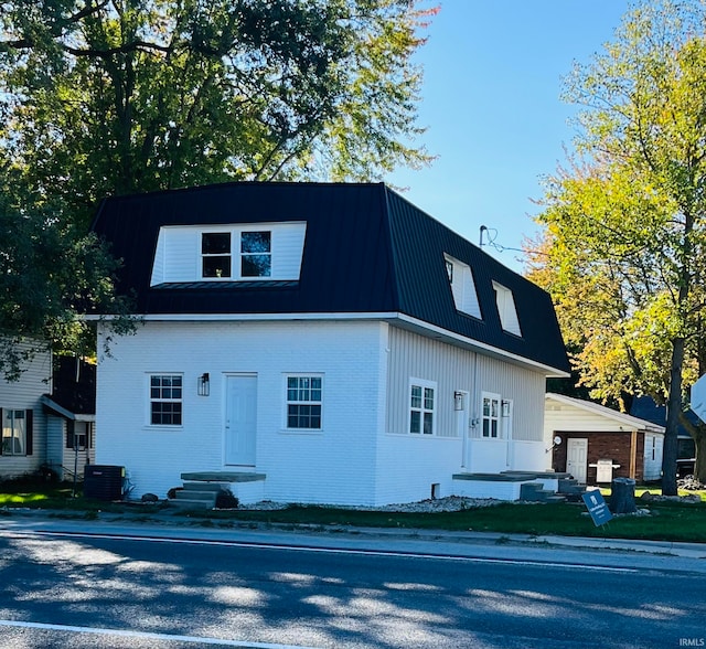 view of front of home with central AC unit