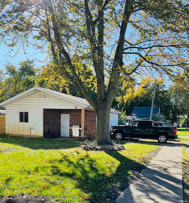 view of front of home with a front yard