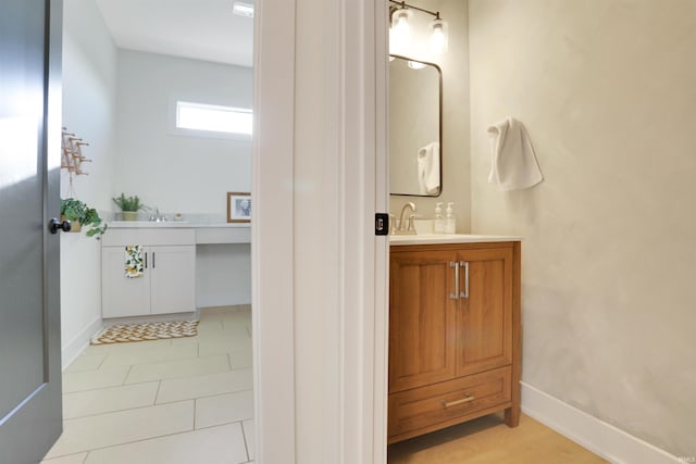 bathroom featuring vanity and tile patterned flooring