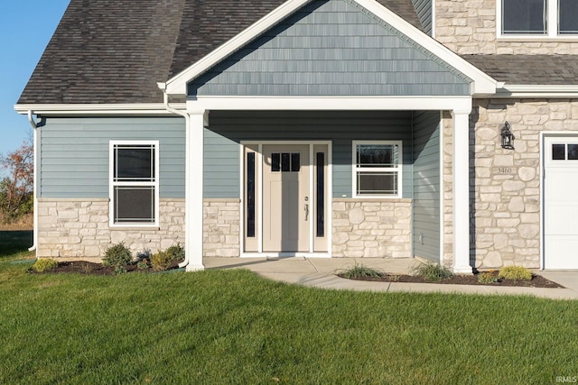 property entrance featuring a porch and a yard