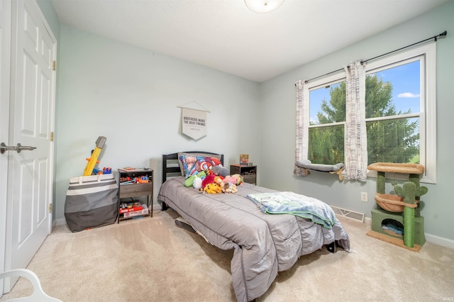 bedroom featuring carpet flooring